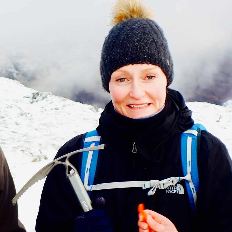 winter mountaineering with ice axe Glen Coe Scotland