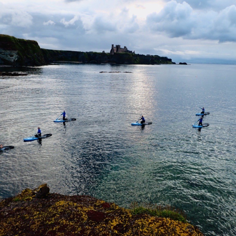 paddle boarding SUP by Tantallon Castle East Lothian Scotland