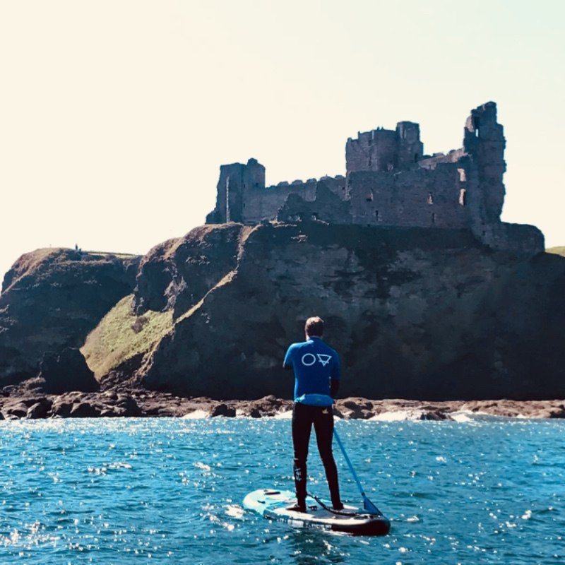 paddle boarding SUP by Tantallon Castle North Berwick and Dunbar East Lothian