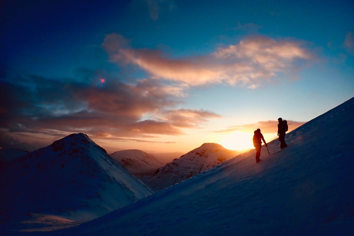 winter mountaineering and sunrise over glen coe scotland 2