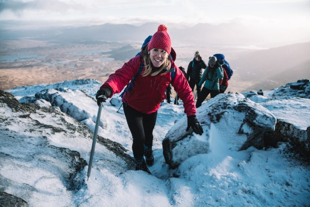 woman snow winter mountaineering skills climbing glen coe scotland