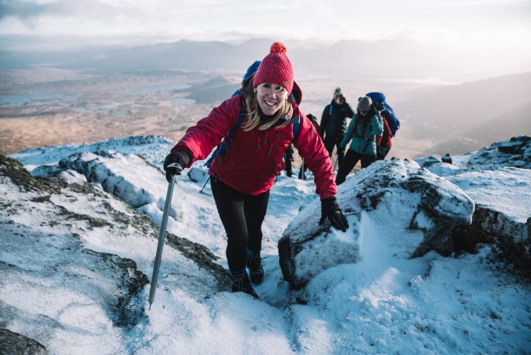 woman snow winter mountaineering skills climbing glen coe scotland