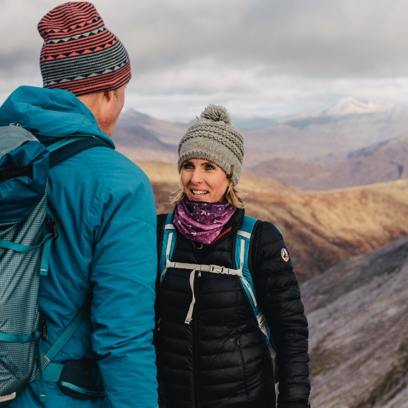 woman winter mountaineering buachaille etive beag glen coe scotland